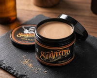 Suavecito Clay Pomade - open potje met zichtbare inhoud en textuur