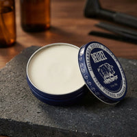 Reuzel Fiber Pomade - open potje met zichtbare inhoud en textuur
