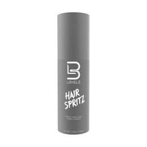 Level3 Hair Spritz, vista frontal de botella de spray gris con etiqueta, estudio blanco