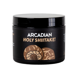 Arcadian Holy Shiitake! Texture Cream, vista frontal del tarro negro con ilustración de shiitake