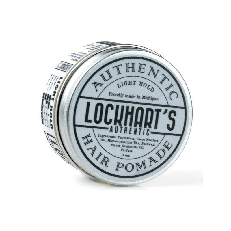 Lockhart's Light Hold Pomade, lata tumbada con etiqueta en la tapa y lista de ingredientes