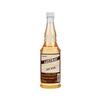 Lustray Aftershave - vista frontal de botella de color ámbar Bay Rum sobre fondo blanco