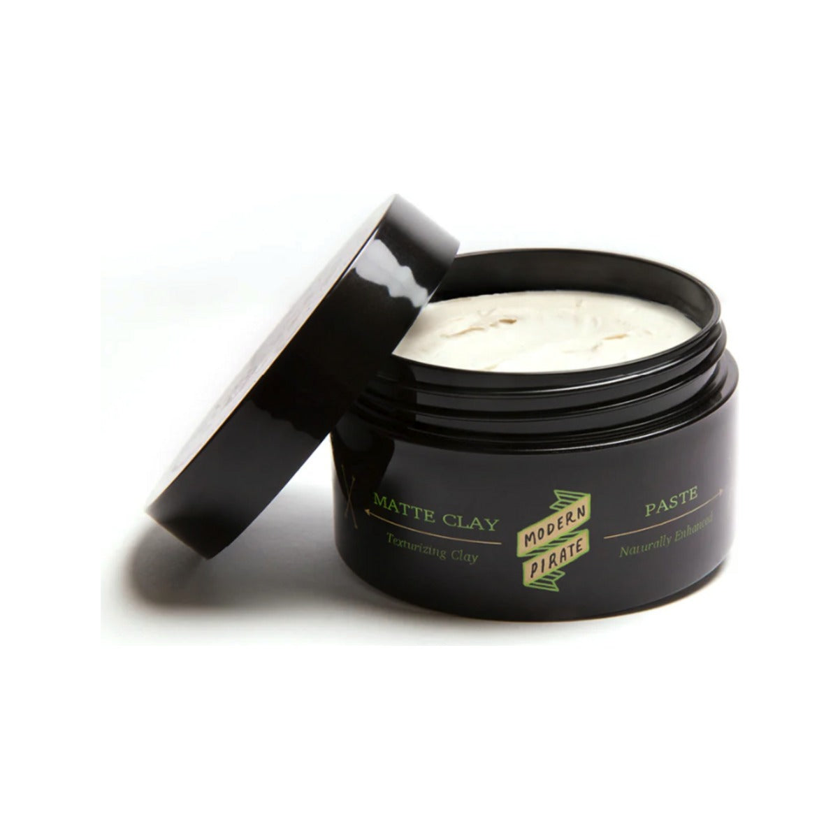 Modern Pirate Matt Clay Paste - tarro negro abierto con textura blanca visible y tapa al lado