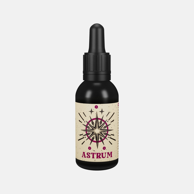 By Elementum Mollis Astrum Beard Oil, vista frontal del frasco negro con pipeta y etiqueta de estrellas