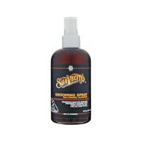 Suavecito Grooming Spray - vista frontal de frasco marrón con pulverizador y etiqueta