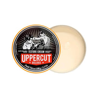Uppercut Texture Cream - tarro abierto de 100 g con crema junto a tapa con etiqueta de boxeadores