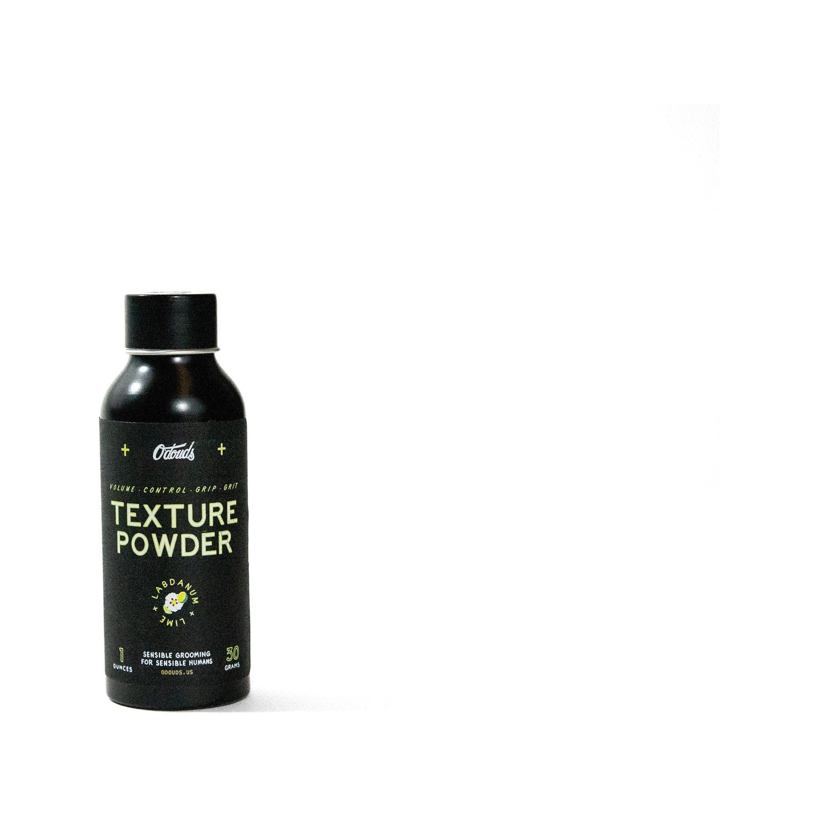 O'Douds Texture Powder, vista frontal del bote negro con etiqueta
