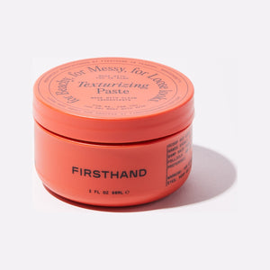 Firsthand Supply Pasta texturizante, vista frontal del tarro naranja cerrado con tapa