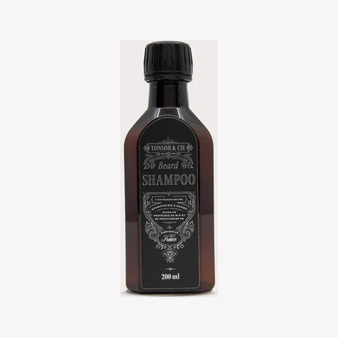 Tonsor & Cie Champú para barba, vista frontal de botella ámbar con etiqueta negra, 200 ml